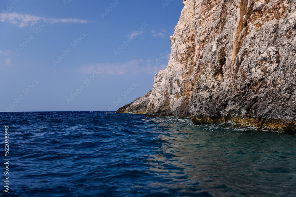 Rocky shorelines and caves along the coast of Corfu Greece
