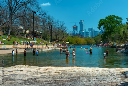Barton Springs natural cold spring swimming pool in downtown in Austin Texas photo