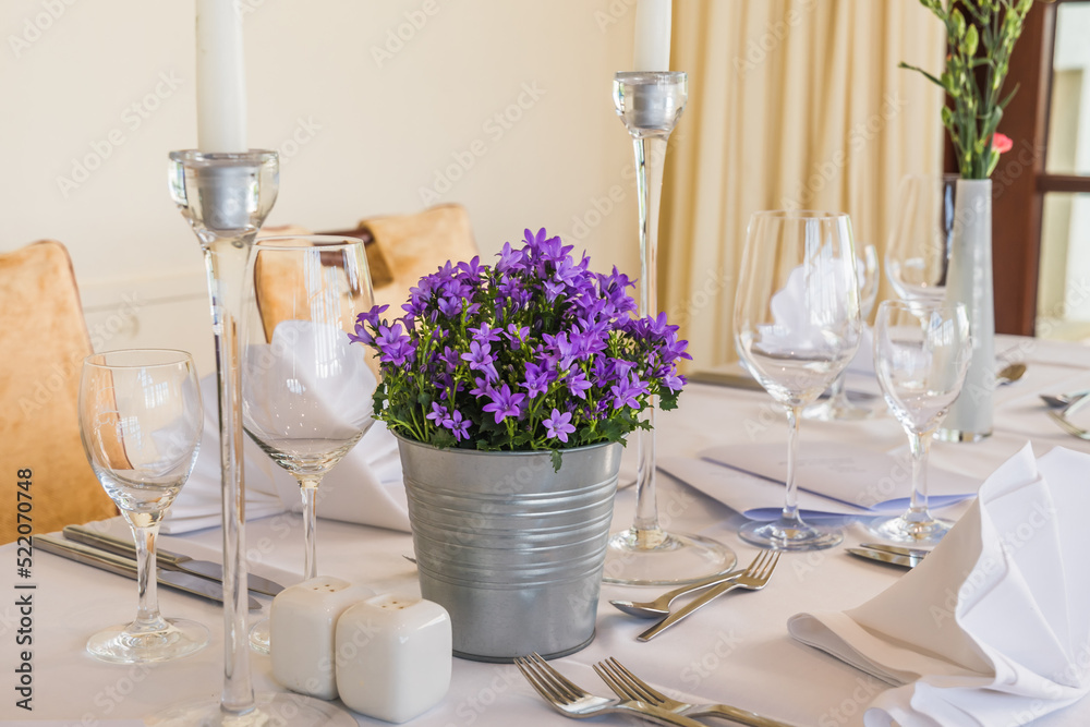 Table setting with bluebells for fine dining for a wedding or other catered event