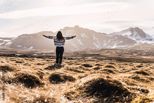 woman meditating in the landscapes of iceland