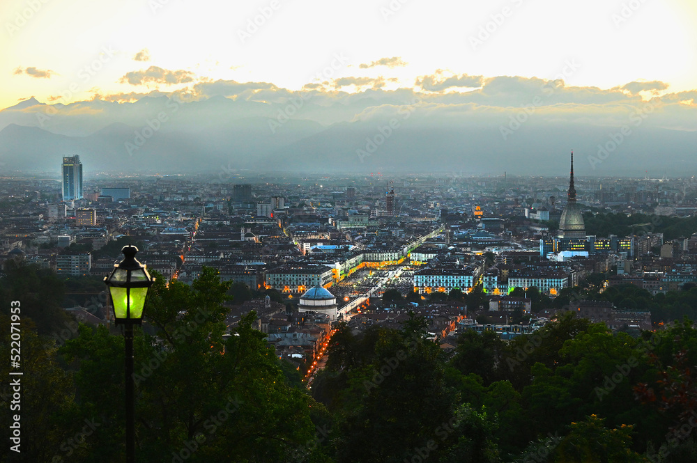 Panoramic scenic view of city downtown from the hill at sunset Turin Italy