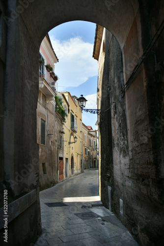Fototapeta Naklejka Na Ścianę i Meble -  A narrow street in Sant'Agata de 'Goti, a medieval village in the province of Benevento in Campania, Italy.