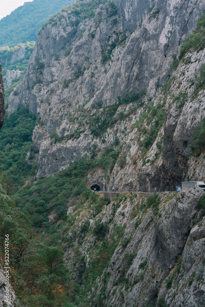 Obraz premium the gorge between the mountains where the highway runs along the Moraca River, Montenegro