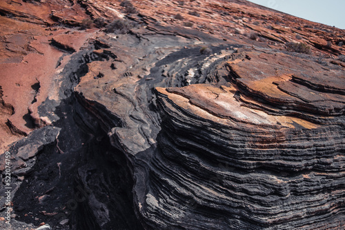 Beautiful rock formations and natural cracks in the natural park of the Canary Islands, Timanfaya
