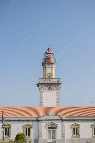 Red lighthouse on a summer day