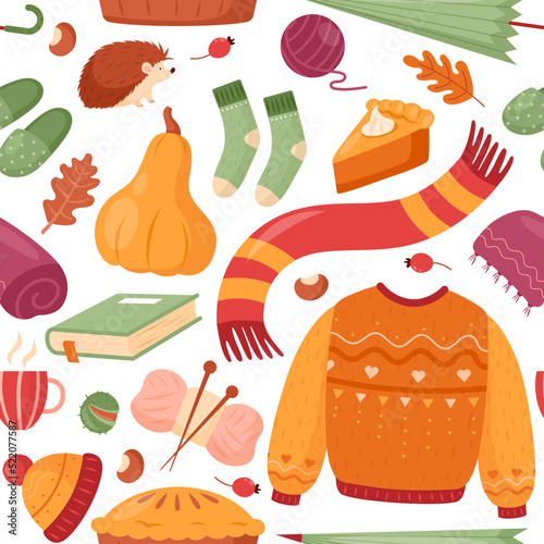 Autumn set seamless pattern. Vector illustration of cartoon fall icons: leaves, sweater, pumpkins, hedgehog, book, candle. Autumn season elements for harvest festival and Thanksgiving day, print