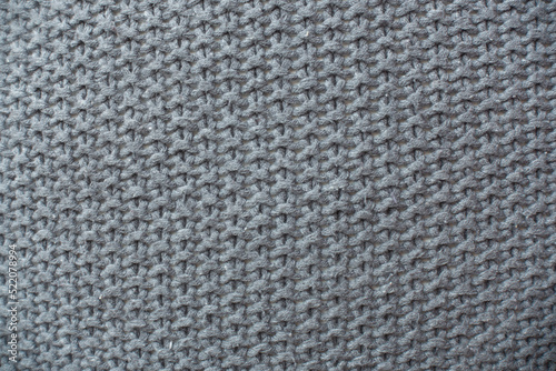 Knitted hemp fabric. Gray woven background. 