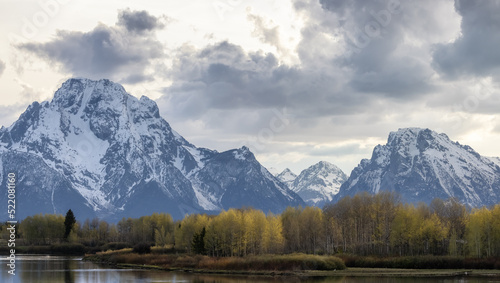 Snow Covered Mountains in American Landscape. Spring Season. Grand Teton National Park. Sunset Sky. Wyoming, United States. Nature Background. © edb3_16