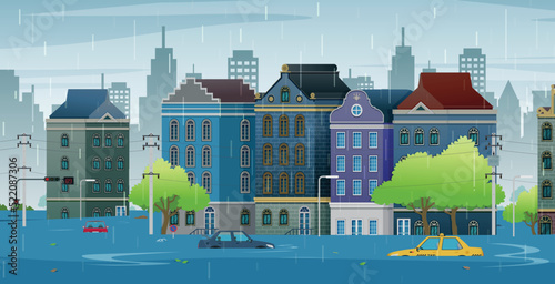 Buildings and cars are drowning from the continuous rain.