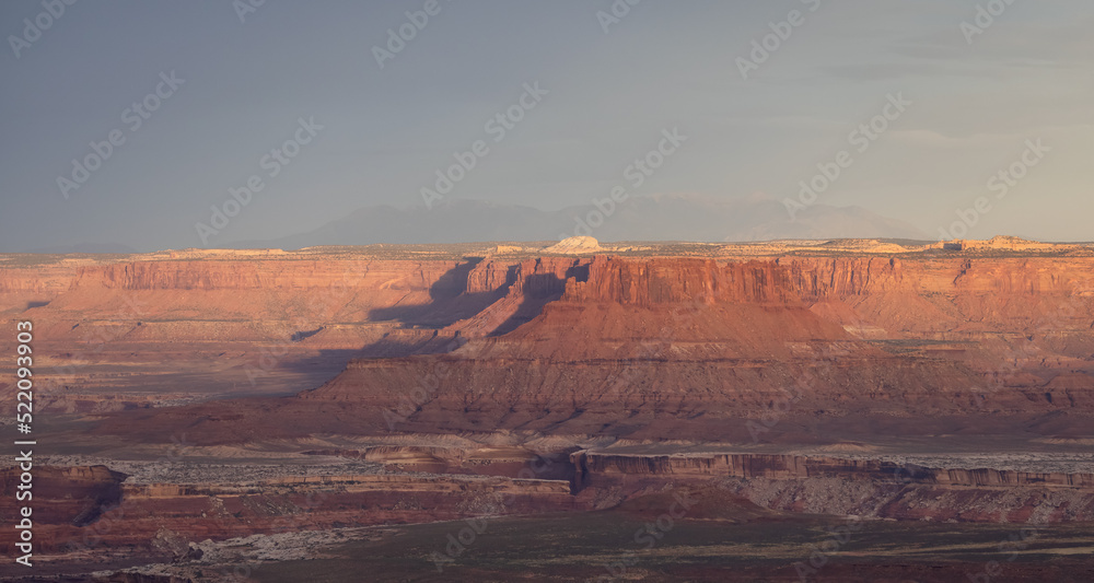 Scenic American Landscape and Red Rock Mountains in Desert Canyon. Spring Season. Canyonlands National Park. Utah, United States. Nature Background. Sunset Scenic American Landscape and Red Rock Mountains in Desert Canyon. Spring Season. Canyonlands National Park. Utah, United States. Nature Background. Sunset