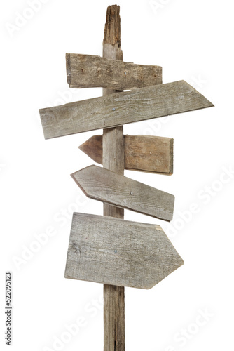 Weathered and rough hewn wood signs pointing in various directions