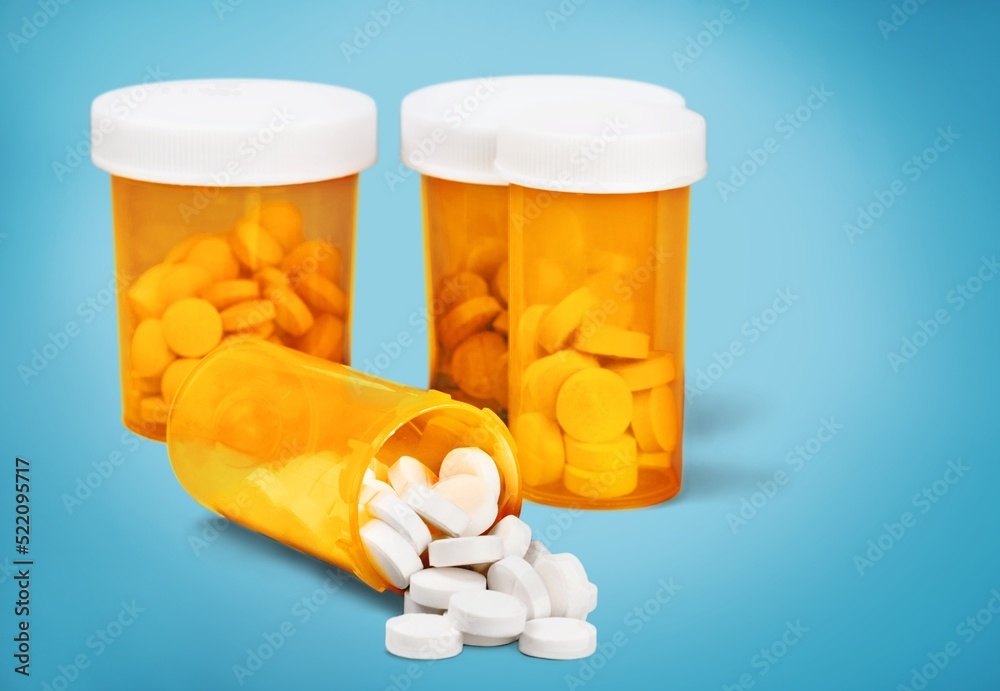Set of pills in RX prescription drug bottle Set of pills in RX prescription drug bottle