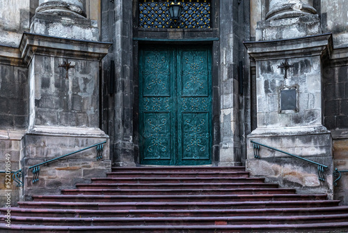 Ancient doors in the cathedral, turquoise old doors. © puhimec