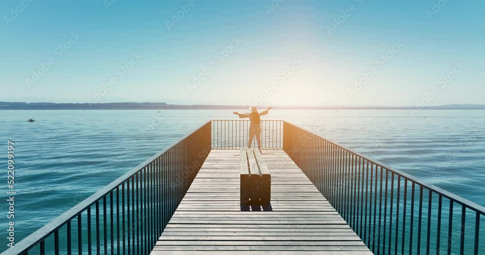 Lifestyle portrait of happy young african female person raising arms up showing happiness on summer day