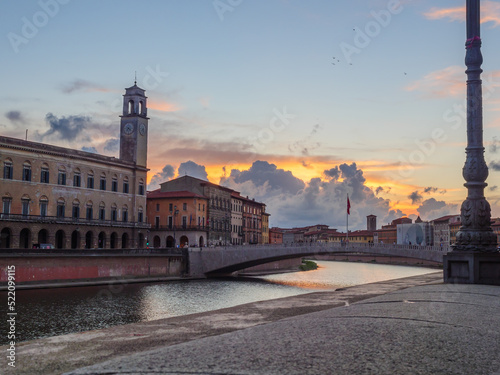 View of the Arno at sunset from the city of Pisa