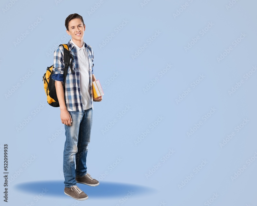 Happy young businessman on blue background Happy young businessman on blue background