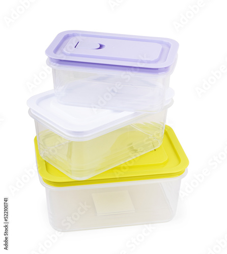 Plastic containers for food on wooden table on blue background