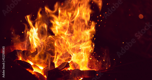 Burning fire in blacksmith's workshop forge