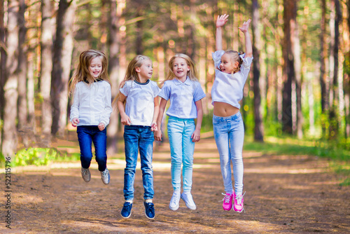 A group of girls having fun in the forest.