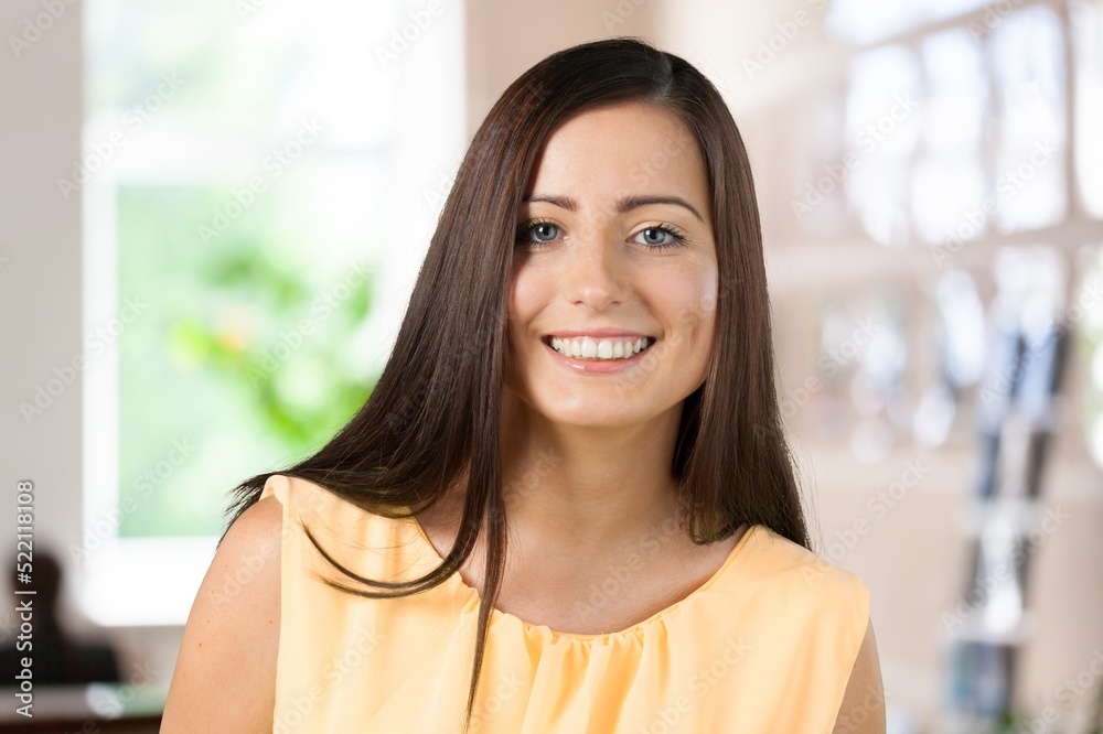 Fototapeta premium Confident young woman in modern own new apartment or house. Diversity concept.