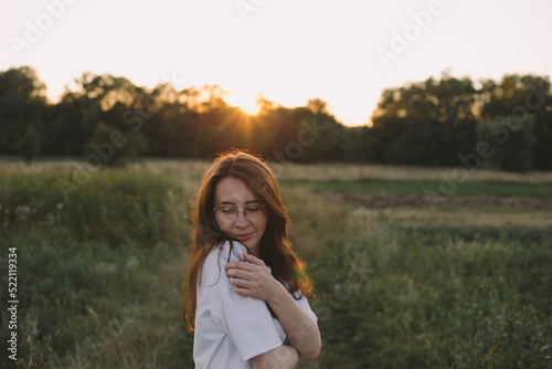 portrait of a woman in a field