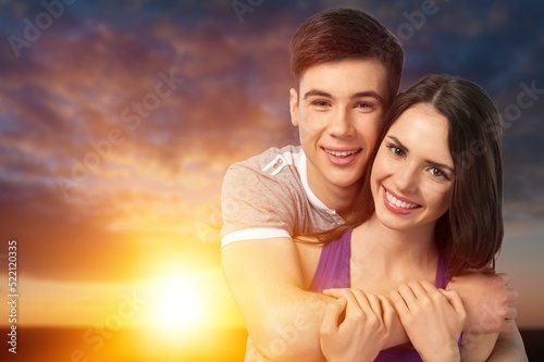 Young cheerful happy couple to joyful, over sea beach ocean outdoor seaside in summer day © BillionPhotos.com