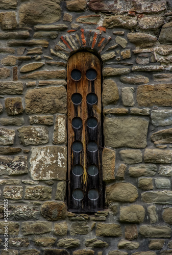 Obraz na płótnie Wooden windows in an ancient Alanian temple w salonie