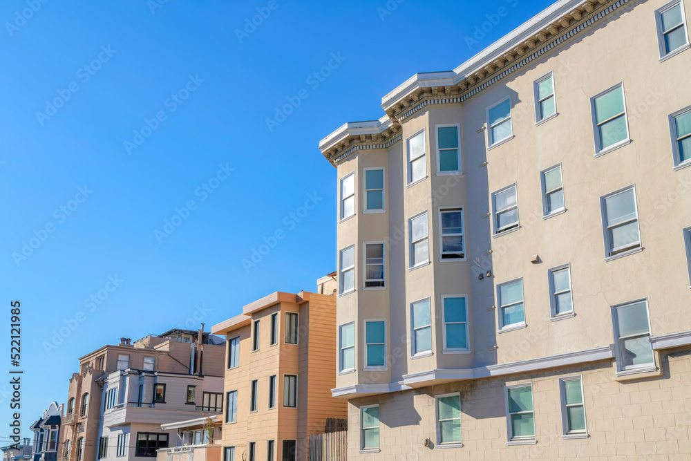 Large residential buildings in a row in an urban area at San Francisco, CA