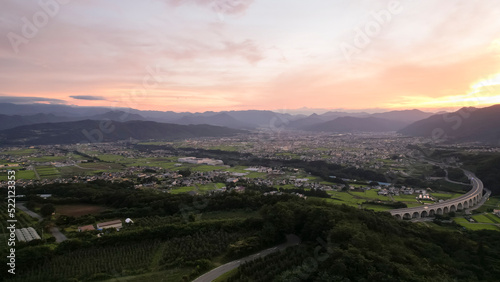 日本の田舎町 信州上田の町並みの夕景を空撮
