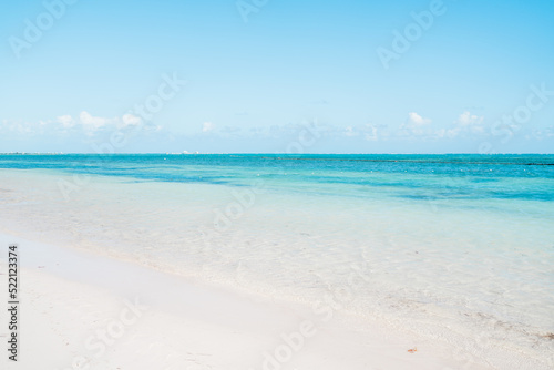 beach with sand and blue sky