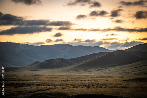 sunrise in the mountains, near song-köl lake, kyrgyzstan, central asia, summer pasture