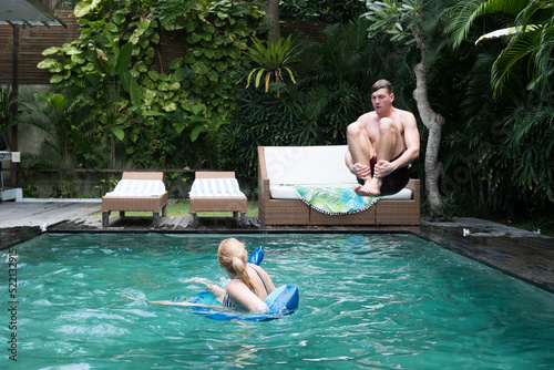 Dive bombing in the pool photo