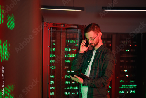 Programmer consulting with coworker about system failure 