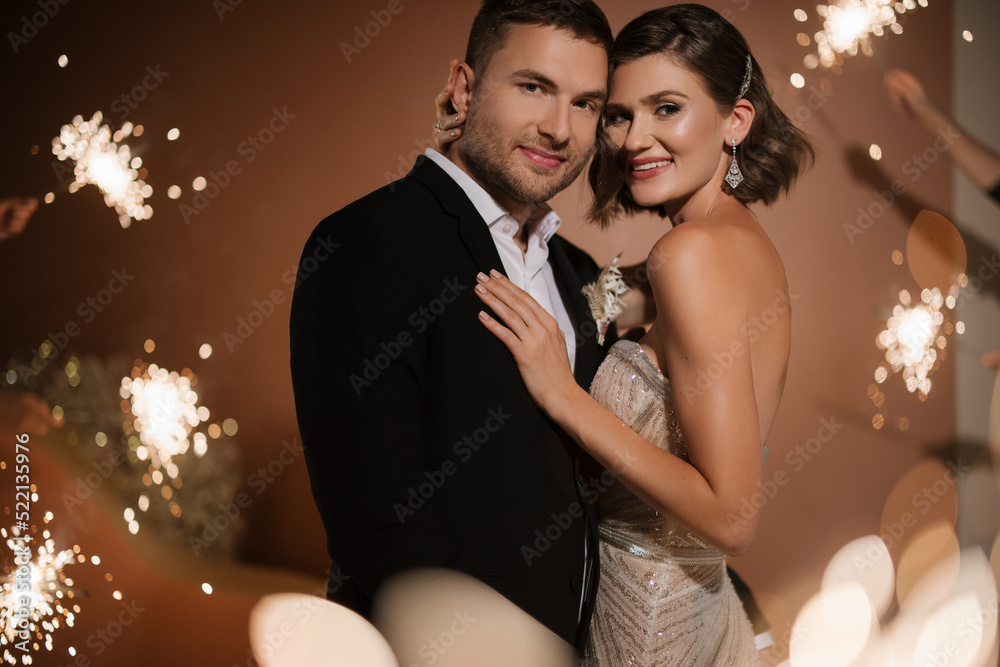 Portrait Of Hugging Just Married Couple