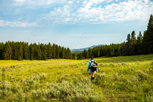 Woman Hikes through Yellowstone Wilderness