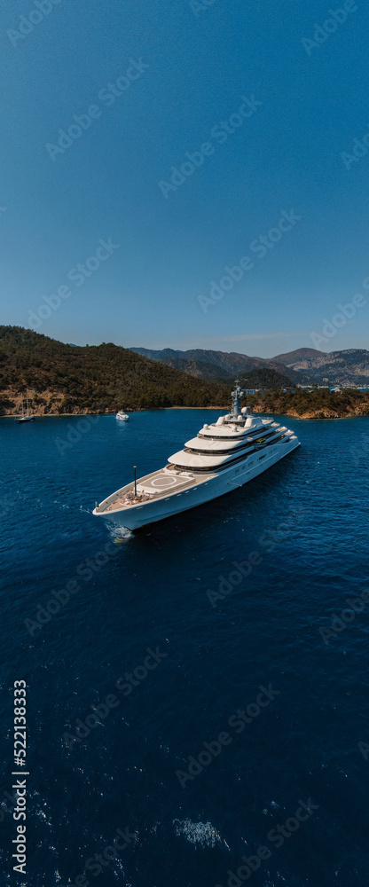 aerial vertical panorama Of a large super yacht, explorer class aerial vertical panorama Of a large super yacht, explorer class