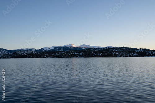 Panorama view of the Andes mountains and Alumine lake, at sunrise, in Villa Pehuenia, Patagonia Argentina.  photo