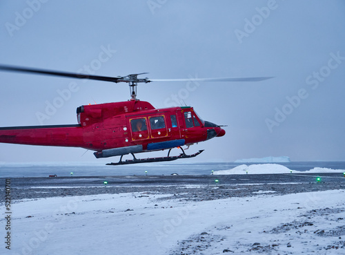 Greenland in winter - helicopter air transport for travel and tourism