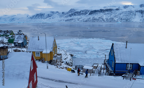 Uummannaq settlement, Greenland: cold High Arctic town locals, winter photo