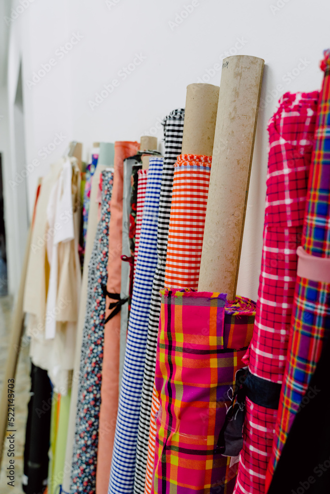 tubes of fabrics with which to design garments.