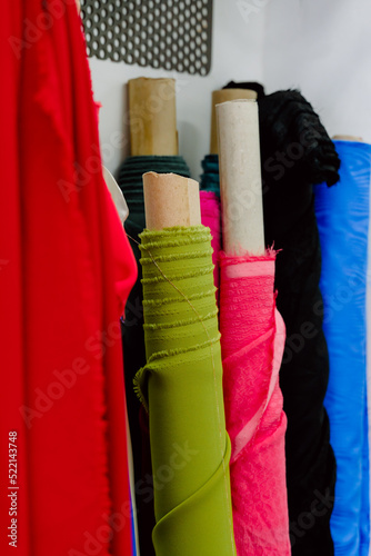 Obraz na płótnie tubes of fabrics with which to design garments. w salonie
