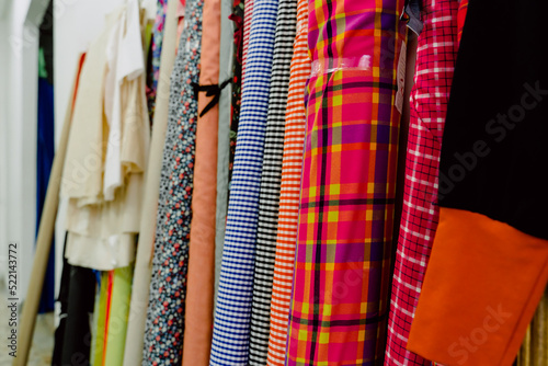 Obraz na płótnie tubes of fabrics with which to design garments. w salonie