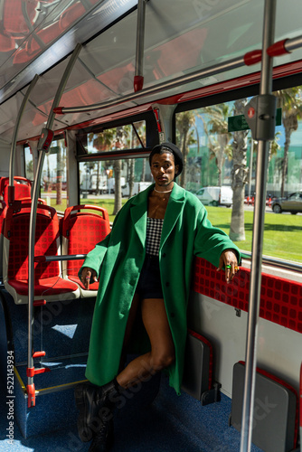 Cool black man standing by  bus