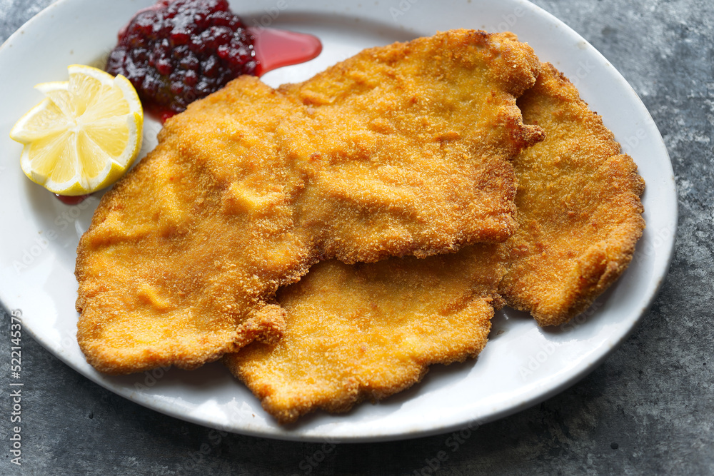 golden breaded german schnitzel golden breaded german schnitzel