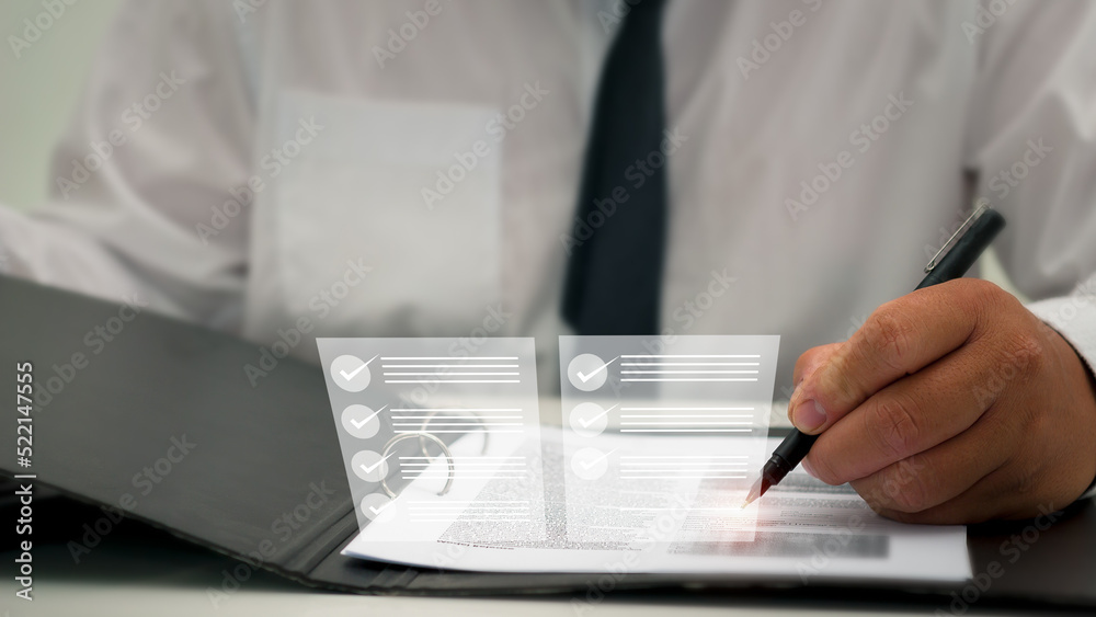 Businessman managing documents (DMS), an online document database. and corporate documents efficiently with ERP, enterprise business technology. Automated process of managing files.