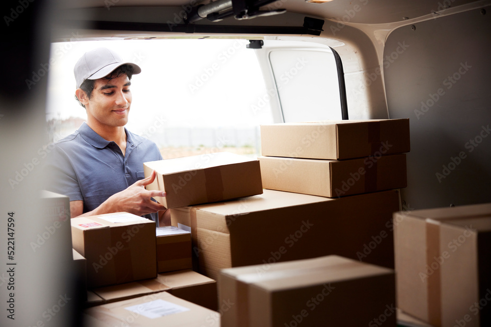 Glad courier stacking boxes in van trunk Glad courier stacking boxes in van trunk