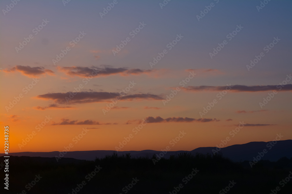 Picturesque view of beautiful field at sunset Picturesque view of beautiful field at sunset