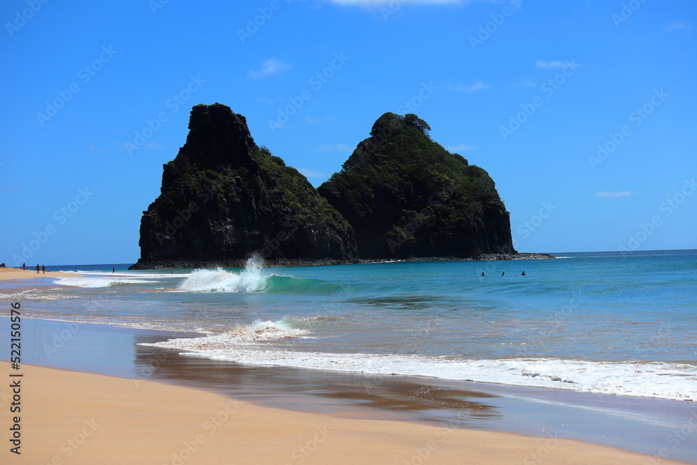 View of Two Brothers Mountain - Morro dos Dois Irmaos in Portuguese - from Cacimba do Padre beach in Fernando de Noronha, Brazil