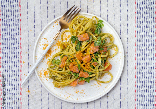 Homemade Spaghetti with raw Salmon and fish eggs photo