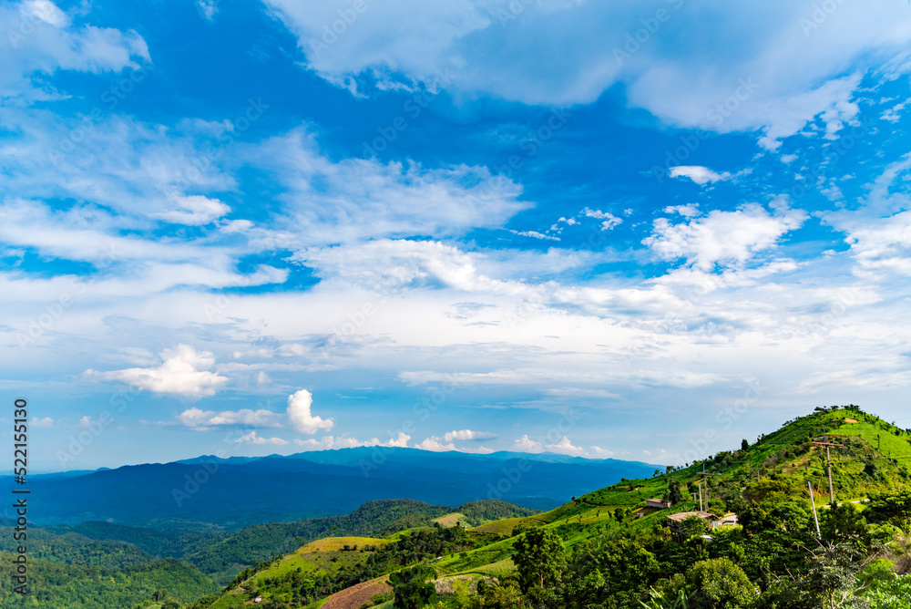 Naklejka premium landscape with mountains and sky at Doi Chang in Thailand